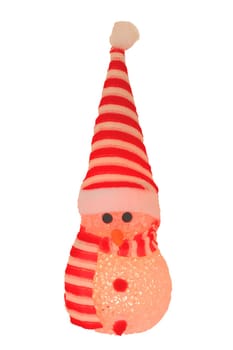 Christmas decoration isolated. Close-up of a yellow illuminated happy cute winter snowman with red white striped hat and scarf isolated on a white background. Macro photograph.
