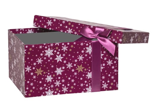 Gift box isolated. Close-up of a pink present or gift box with ribbon bow isolated on a white background. Birthday, valentine, anniversary or other holidays. Macro photograph.