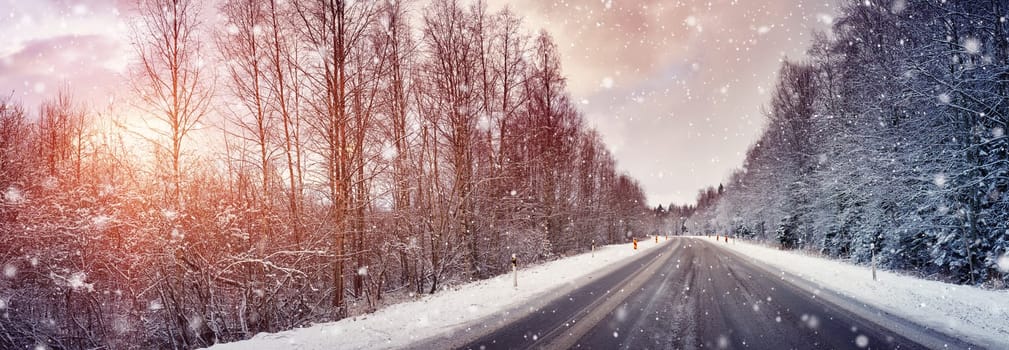 Car on winter road covered with snow