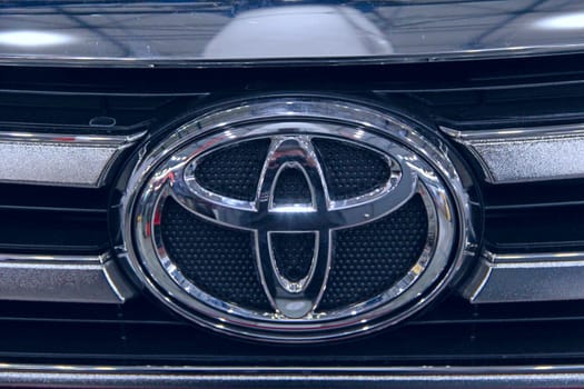 Modern Toyota car icon is presented at exhibition in Kiyv. Japanese brand auto Toyota. Sign of Toyota