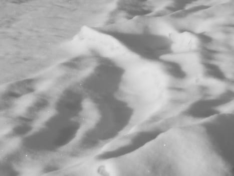 drifts of white snow light and shadow background