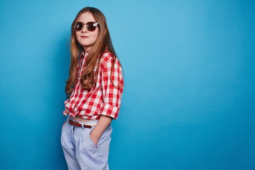 Girl with faint smile looking at camera