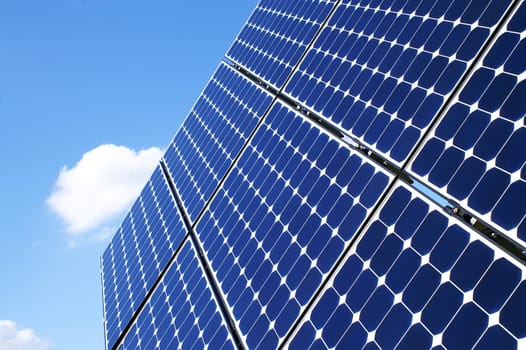 Solar panels on with a blue photocell, replacing old sources of electricity