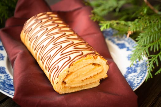 Buche de Noel is traditional French Christmas cake, golden yule log cake