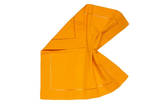 Closeup of a yellow napkin or tablecloth isolated on white background. Kitchen accessories.