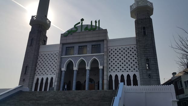Seoul, South Korea - February 12, 2019:  Seoul Central Mosque, the first and biggest Islamic mosque in South Korea located in Itaewon Dong area. It has minerates and Letters with Allahu Akbar which means "Allah is the greatest""."