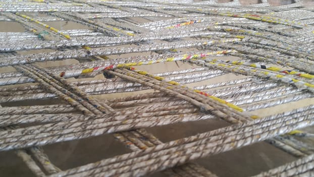 Closeup view of dried jute thread or ropes interwoven for making traditional old style bed called charpai