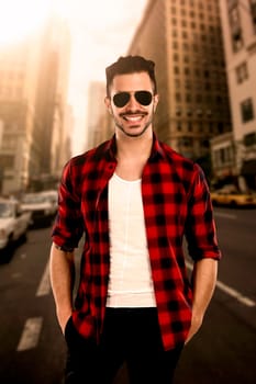 Portrait of a handsome young man on a street of New York