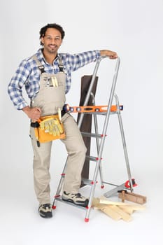 Carpenter stood with ladder