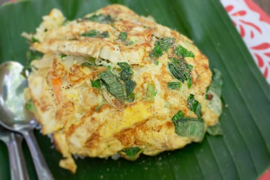 Simple vegetarian omelette rice meal, stock photo