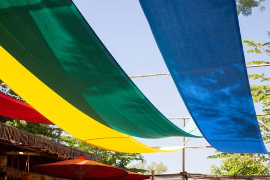 Hanging colorful fabric decorated in the garden, stock photo