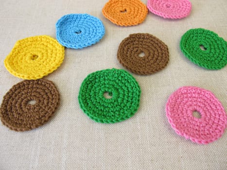 Crocheted, reusable, washable cosmetic pads from colorful wool