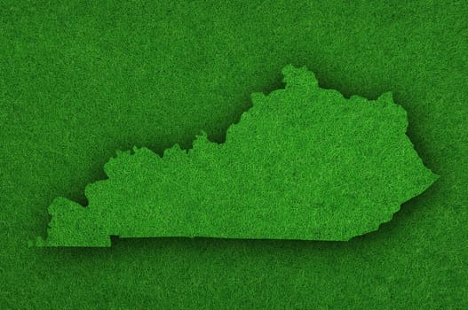 Map of Kentucky on green felt