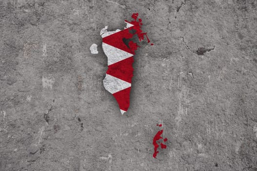 Map and flag of Bahrain on weathered concrete
