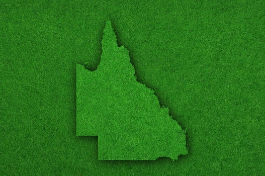 Map of Queensland on green felt