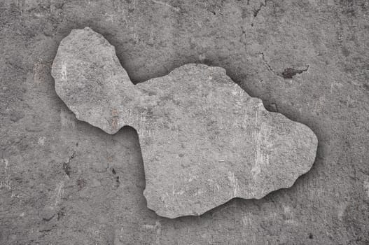 Map of Maui on weathered concrete