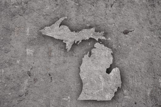 Map of Michigan on weathered concrete
