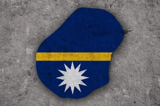 Map and flag of Nauru on weathered concrete