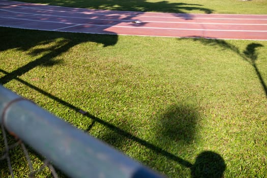 Outdoor track and field stadium with runway, stock photo