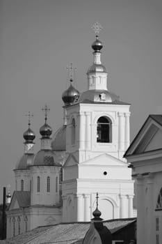 high white bell tower orthodox church black and white