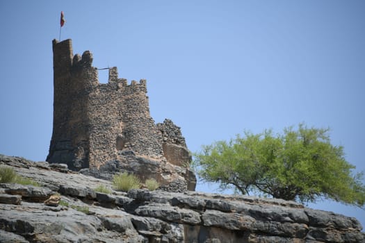 A ruin in the oasis of the mountain village Misfah in Oman where the famous Falaj irrigation system can be seen.