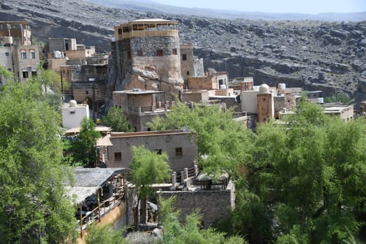The panoramic view over the oasis of the mountain village Misfah in Oman where the famous Falaj irrigation system can be seen.