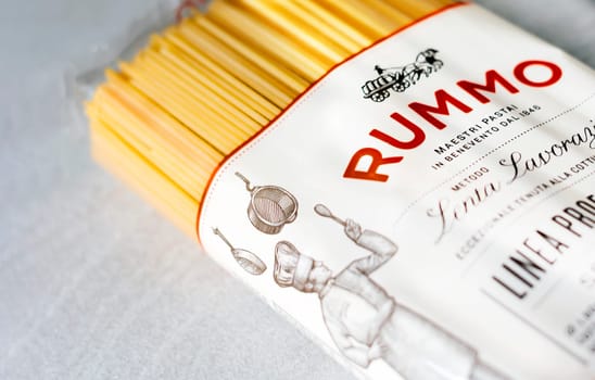 Rome, Italy, November 15th 2020: the Rummo logo printed on the transparent package of spaghetti pasta. Famous Italian brand in the pasta market. Illustrative editorial