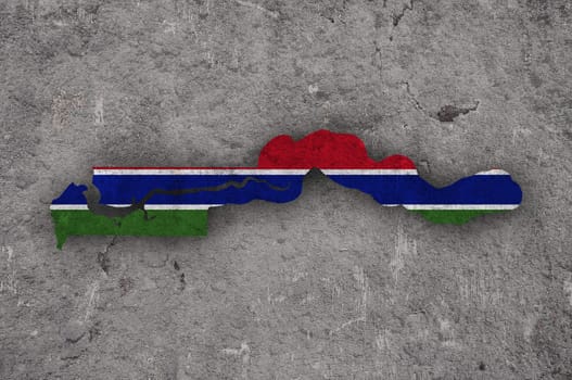 Map and flag of The Gambia on weathered concrete