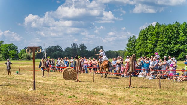 Cedynia, Poland June 2019 Mounted archery or horseback archery show with flying arrow at historical reenactment of Battle of Cedynia from 11th century