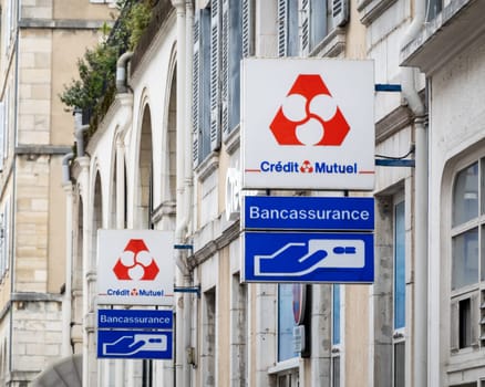 BAYONNE, FRANCE - CIRCA DECEMBER 2020: Credit Mutuel sign outside bank agency.