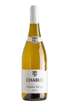 Bottle of white Chablis wine isolated on white, Thierry Mothe domain, vintage 2018. Gilbert et Gaillard International Challenge 2019 gold medal.