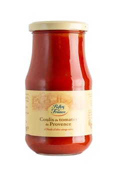 Reflets de France tomato coulis jar isolated on white, tomatoes from the Provence region and olive oil. Reflets de France is a brand of the Carrefour group.