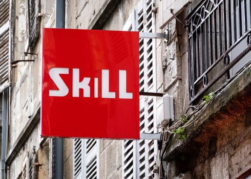 Skill sneaker shoe shop sign in Bayonne, France.