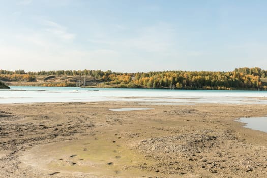 The water in the ash dump seems as beautiful as on postcards from distant seaside resorts.