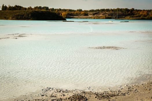 The water in the ash dump seems as beautiful as on postcards from distant seaside resorts.