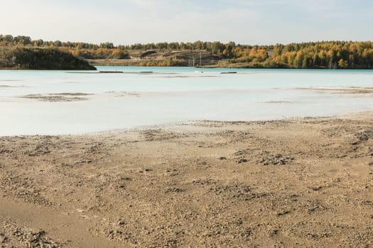 The water in the ash dump seems as beautiful as on postcards from distant seaside resorts.