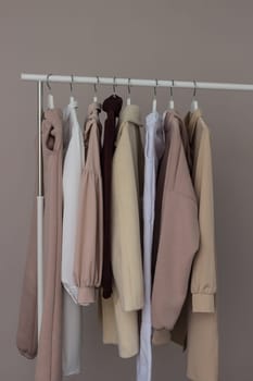 Women's casual clothing on an open hanger.
