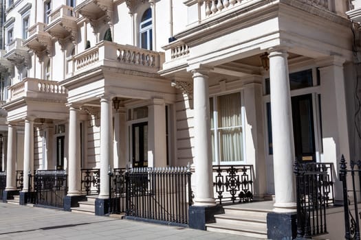 Regency Georgian terraced town house homes and apartments in Kensington London England UK  which area popular travel destination tourist attraction landmark of the city, stock photo image