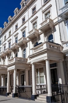 Regency Georgian terraced town house homes and apartments in Kensington London England UK  which area popular travel destination tourist attraction landmark of the city, stock photo image