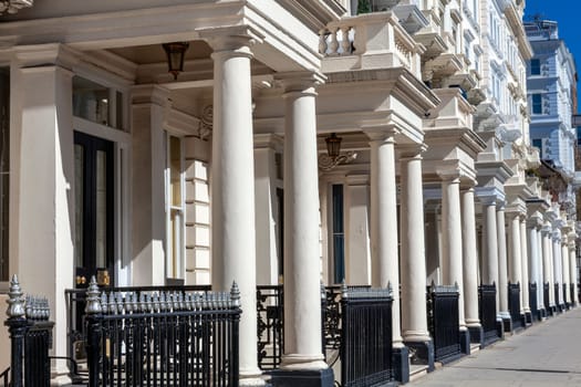 Regency Georgian terraced town house homes and apartments in Kensington London England UK  which area popular travel destination tourist attraction landmark of the city, stock photo image