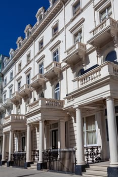 Regency Georgian terraced town house homes and apartments in Kensington London England UK  which area popular travel destination tourist attraction landmark of the city, stock photo image