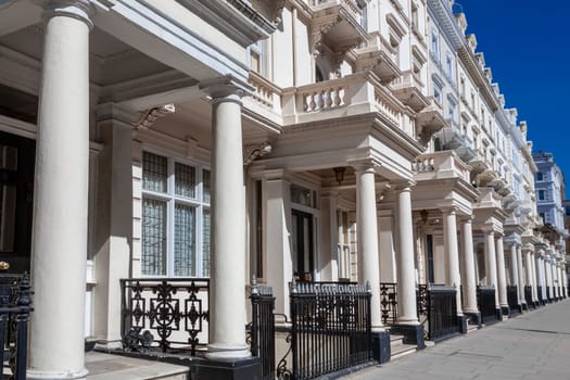 Regency Georgian terraced town house homes and apartments in Kensington London England UK  which area popular travel destination tourist attraction landmark of the city, stock photo image