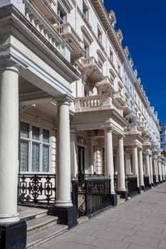 Regency Georgian terraced town house homes and apartments in Kensington London England UK  which area popular travel destination tourist attraction landmark of the city, stock photo image