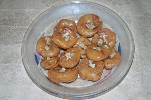 Closeup of delicious and tasty Asian sweet dish called balu shahi or baloshahi or balushahi. This dish is street sweet found in Pakistan India and Bangladesh and served in the festivities.