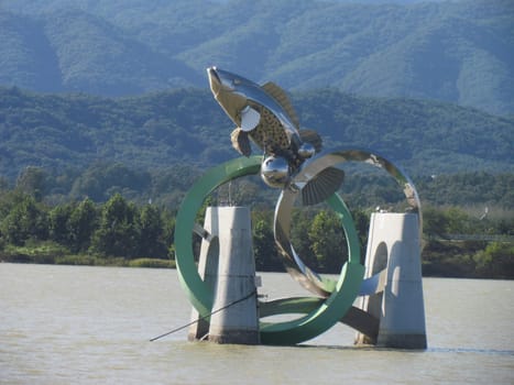 Chuncheon, South Korea- 19th Sep, 2020: The Statue of fish in middle of Soyanggang or soyang river with blue sky