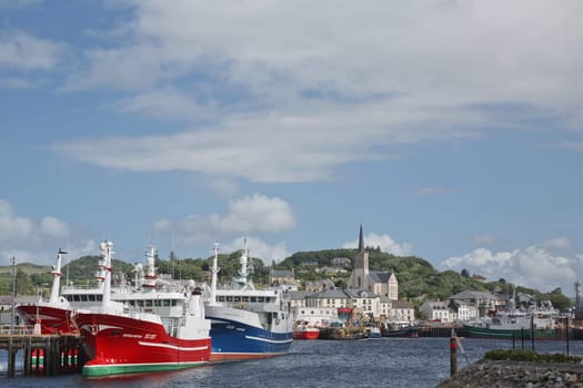 Killybegs, County Donegal, Ireland - June 10, 2017: St. Mary's church and port of Killybegs in county Donegal, Ireland's largest fishing port.
