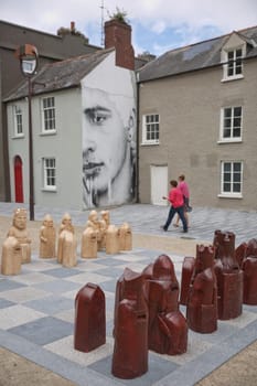Waterford, Republic of Ireland - June 13, 2017: Chess Game in street of Waterford in Ireland representing the Norman invasion in 1169 AD that have been set up in the historic Cathedral Square.