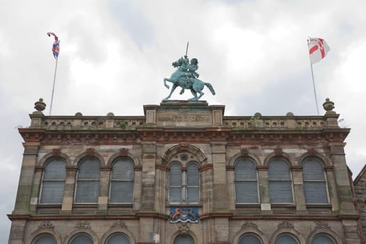 Belfast Orange Hall on Clifton Street with statue of king william on th.e top and stone facade in Belfast Northern Ireland.