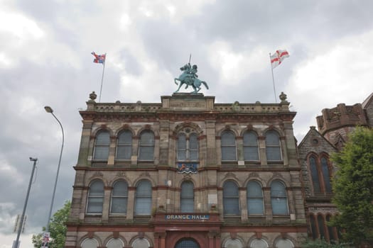 Belfast Orange Hall on Clifton Street with statue of king william on th.e top and stone facade in Belfast Northern Ireland.