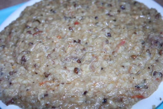 A close up view of Cooked white rice called Kichra served with green mint with traditional Charsadda recipe popular for its delicious taste in Pakistan